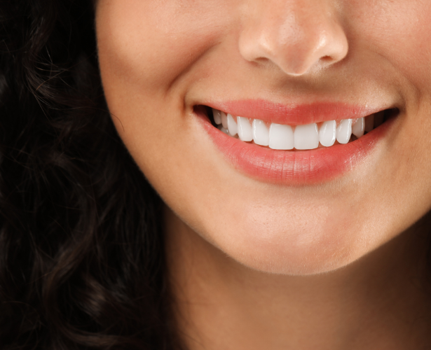 Close-up of a woman’s bright white smile